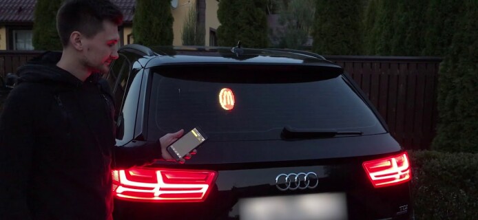 Like stickers in the back window of your car? This device will make them a thing of the past!