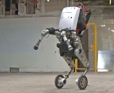 Handle from Boston Dynamics: robot with wheels and a suction arm