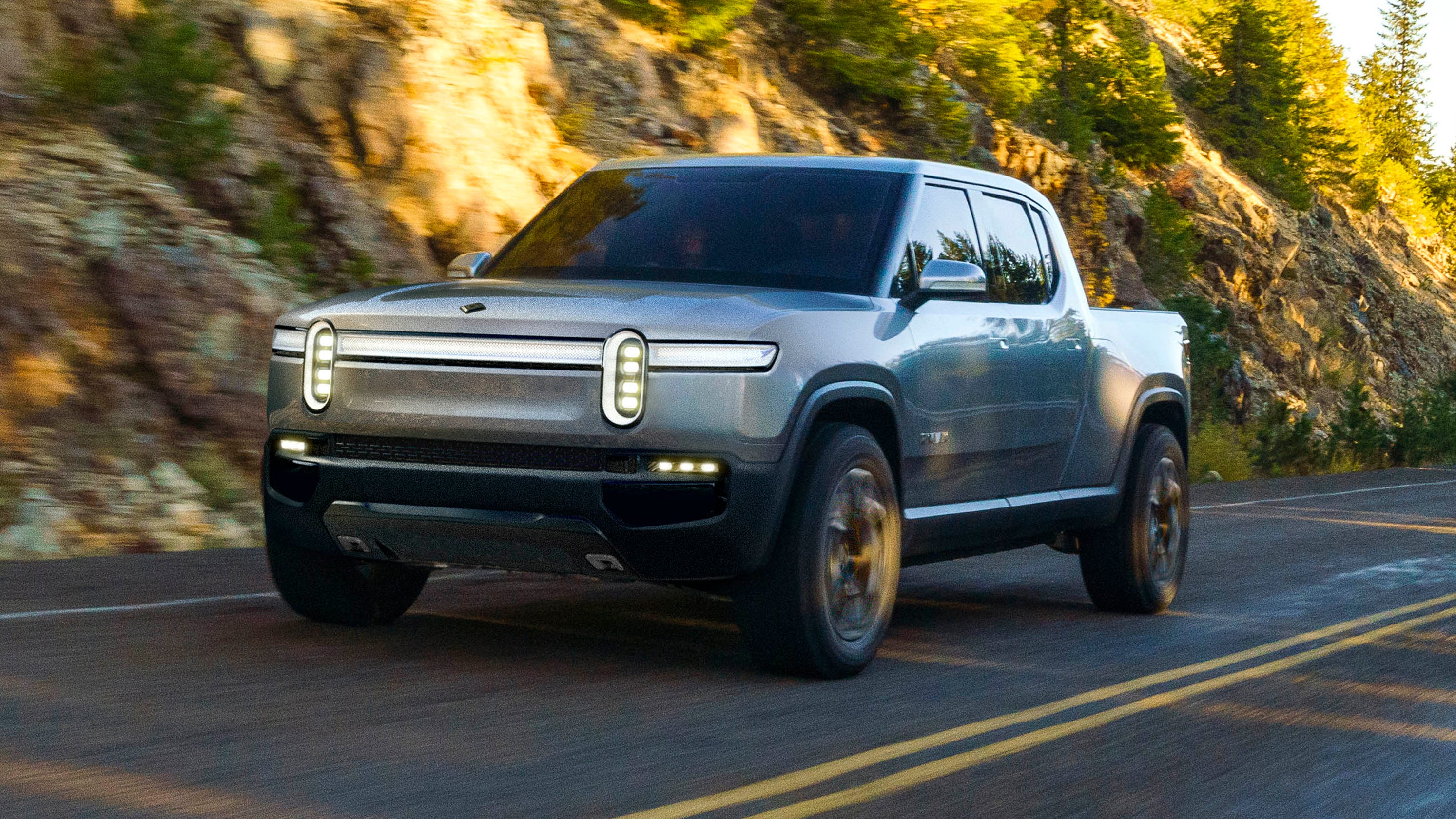 ford announces electric suv based on rivian platform